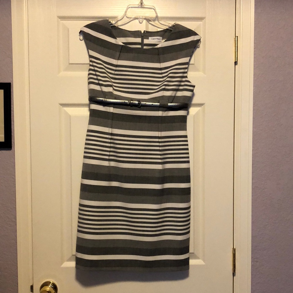 Classic shift with lining,  very tailored,  polyester, rayon, and spandex.